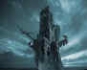 A strange broken tower with spars wrecked on it, beneath a stormy sky.